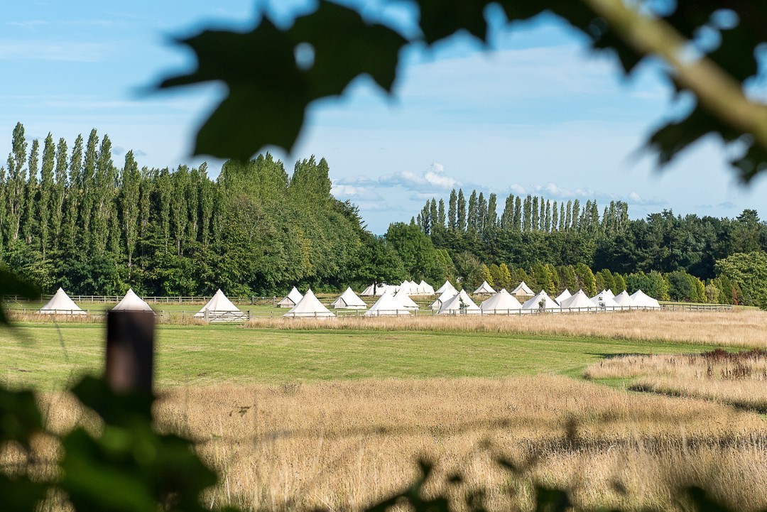 Bell tent village setup for private event