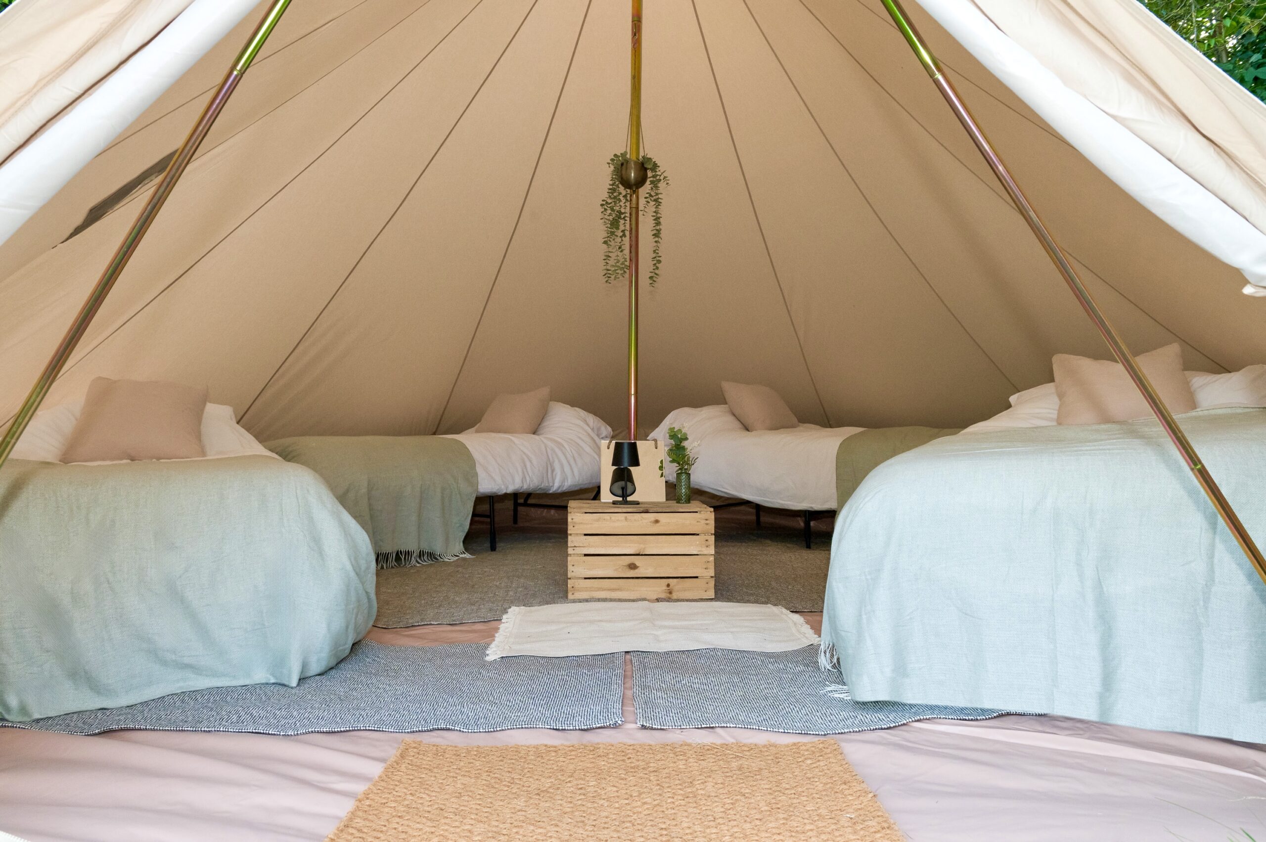 Real bed frames inside a bell tent
