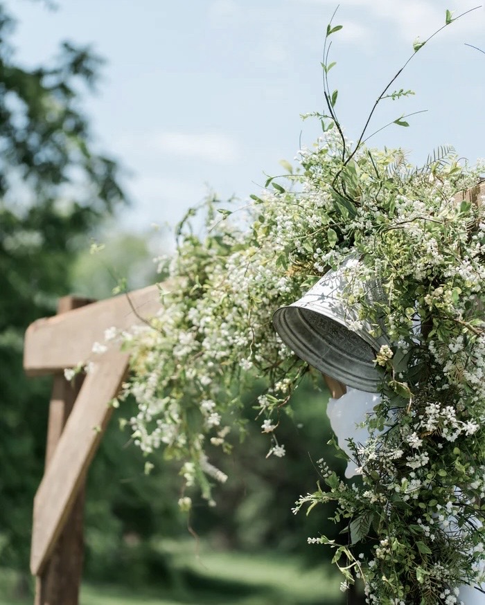 Stretch tent for outdoor wedding with floral decorations